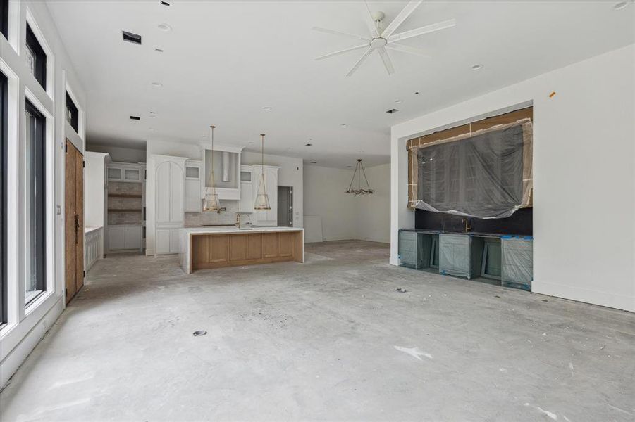 The entertainment center is the perfect backdrop for what will definitely be the heart of this remarkable home.  Photo as of 9/3/2024