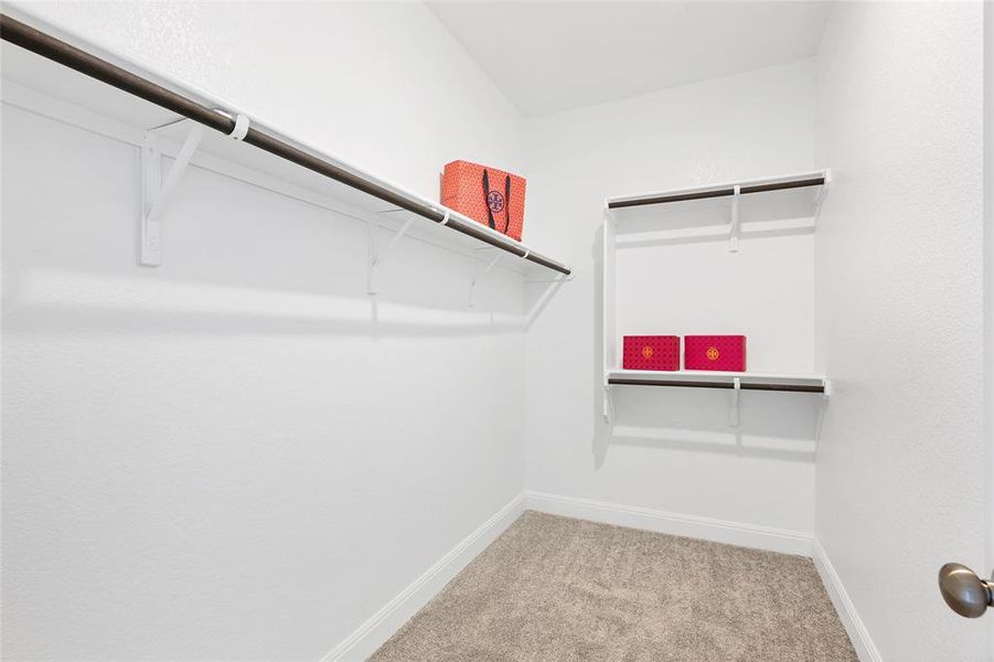 One of two large closets in primary bedroom.