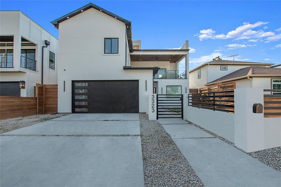 Contemporary home featuring a garage