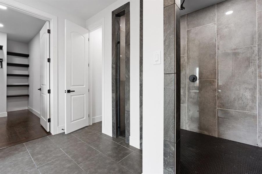 Bathroom featuring a shower and hardwood / wood-style floors