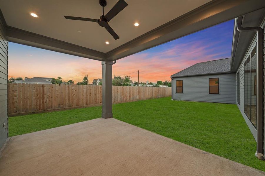The 18x12 covered patio overlooks the oversized lawn!