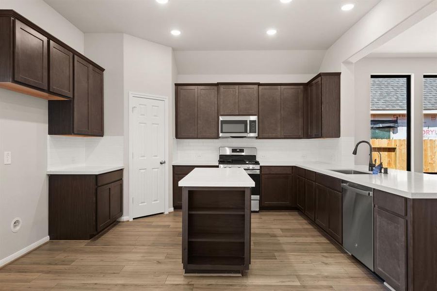 This kitchen is not only a functional space but also has ample storage. Whether you're a seasoned chef or just love to gather and enjoy good food, this kitchen is a dream come true.