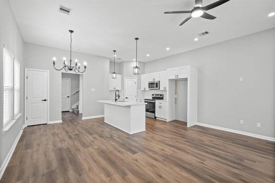 Plenty of natural light and lighting throughout this home. Featuring modern light fixtures and recessed lighting.