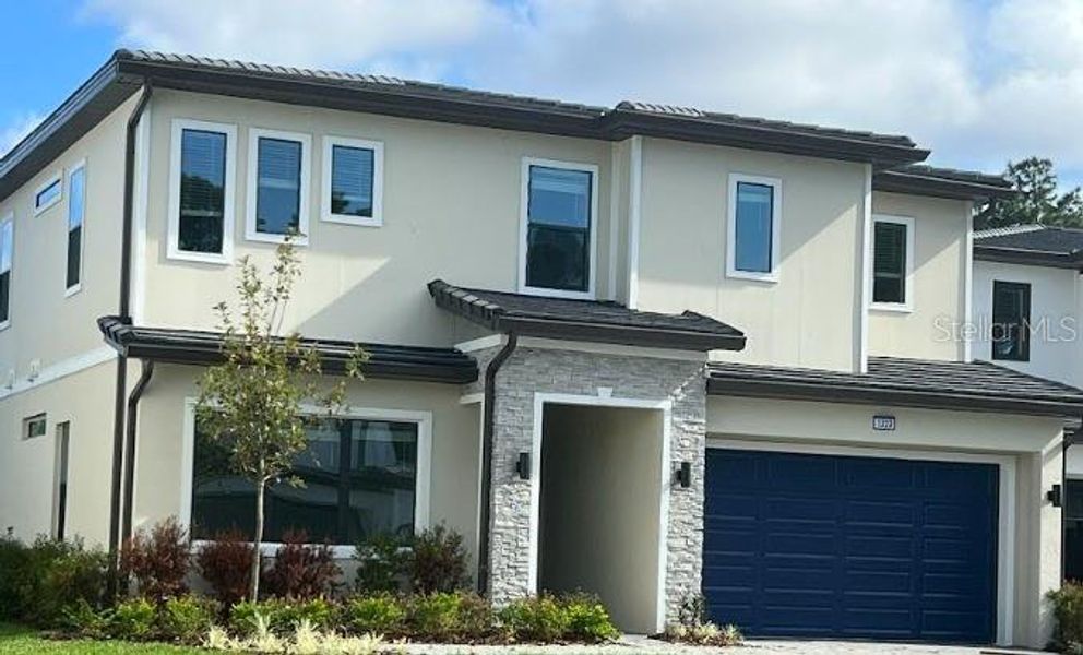 New construction Single-Family house 1302 Butterfly Orchid Road, Davenport, FL 33837 - photo