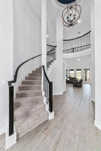 You will love coming home everyday to this Gorgeous entry way with a sweeping circular staircase featuring an elegant Rotunda.