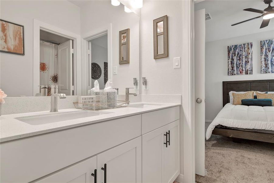 Convenient Jack and Jill Bathroom - Positioned between the 3rd and 4th bedrooms, featuring dual sinks and a full bath, perfect for family convenience.