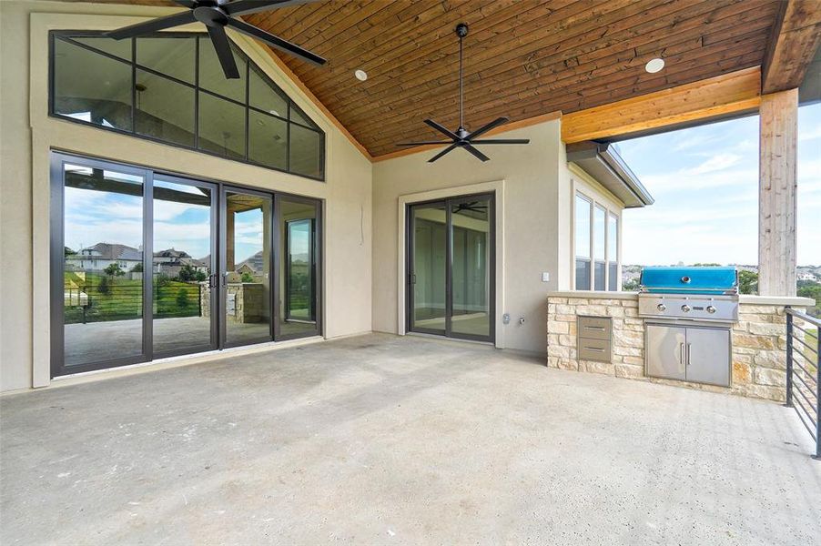 Over sized patio with exceptional views and outdoor built-in bbq.