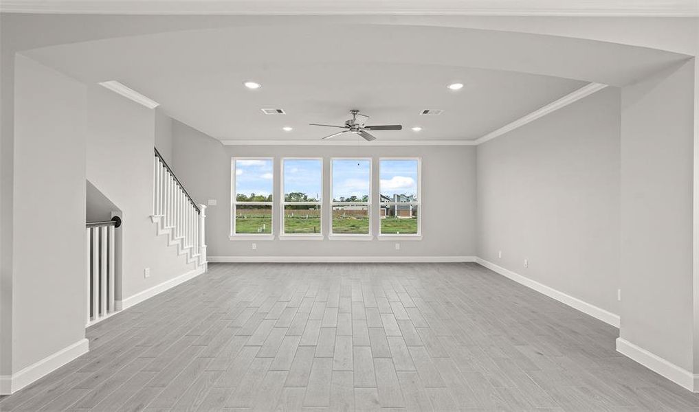 Dining room opens to great room (*Photo not of actual home and used for illustration purposes only.)