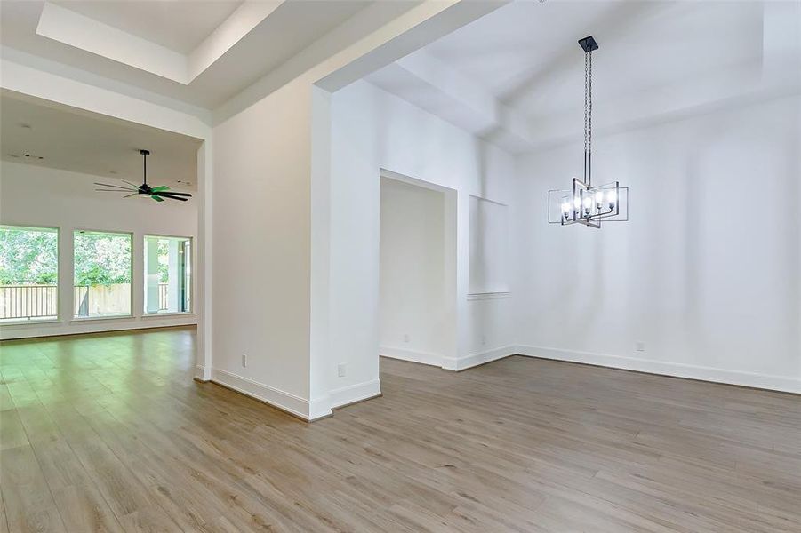 This spacious dining room is perfect for entertaining and will accommodate a large table for 8 dinner guests and a hutch, buffet or china cabinet.