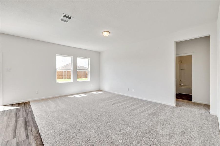 Spare room with light hardwood / wood-style flooring