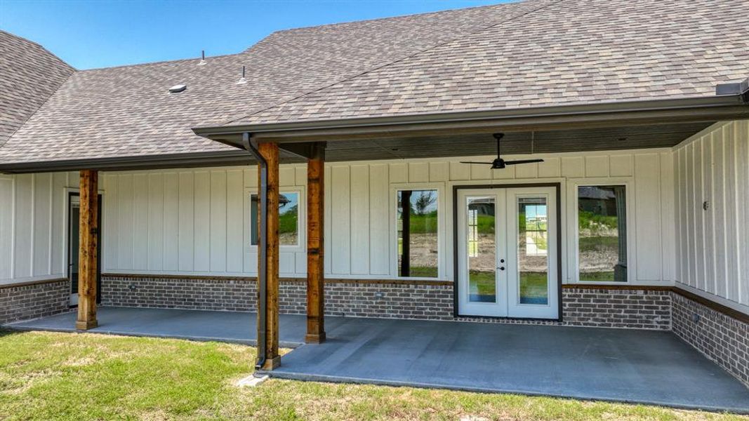 large oversized back patio, french doors and single door access