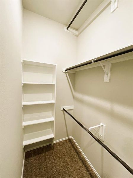 View of the never-ending master walk in closet