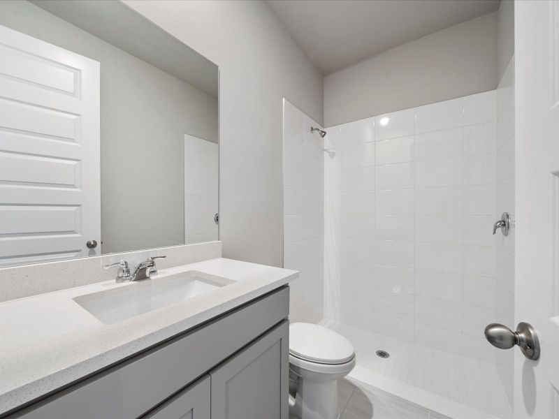 Bathroom in the Coral floorplan at 6326 NW Sweetwood Drive in Brystol at Wylder