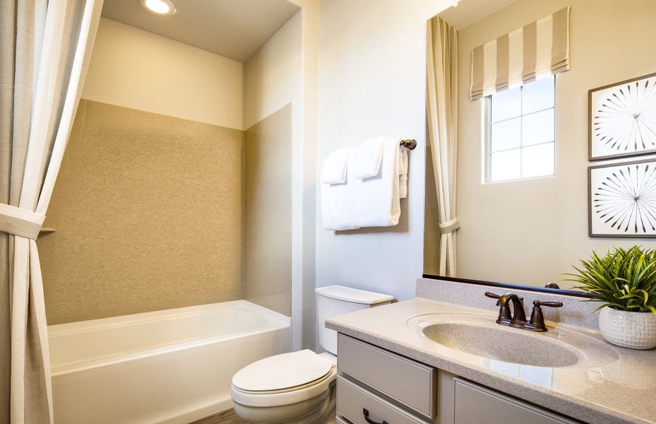 Secondary bathroom with tub and shower