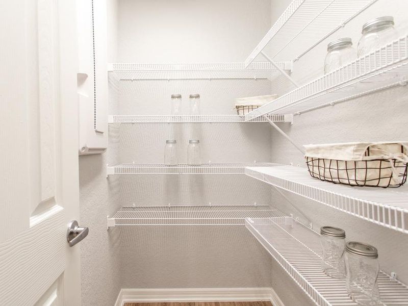 Convenient walk-in pantry - Parker home plan by Highland Homes