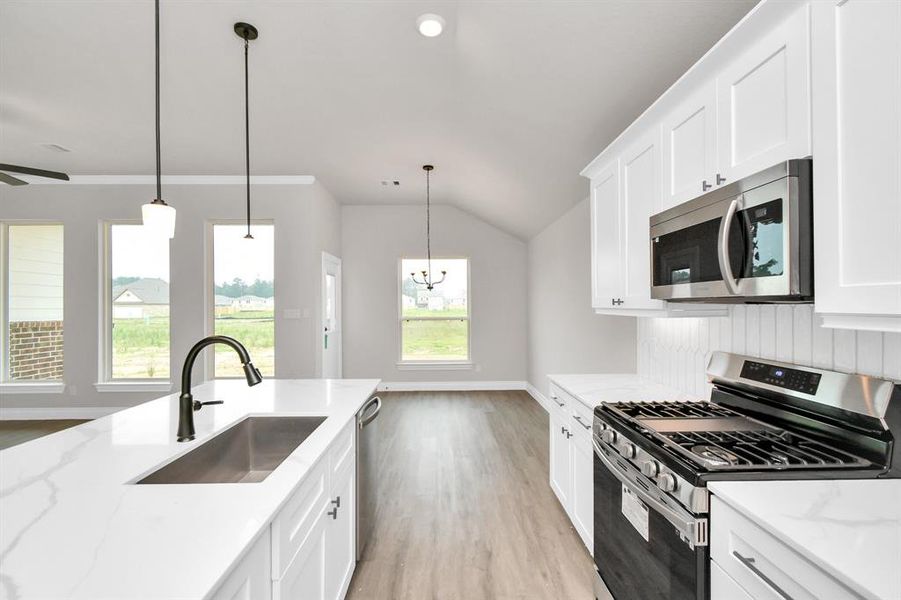 Open concept kitchen with kitchen island