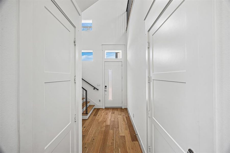 The door to the Left is an spacious closet to storage, and the door to the right is direct access to the attached 2 garage.