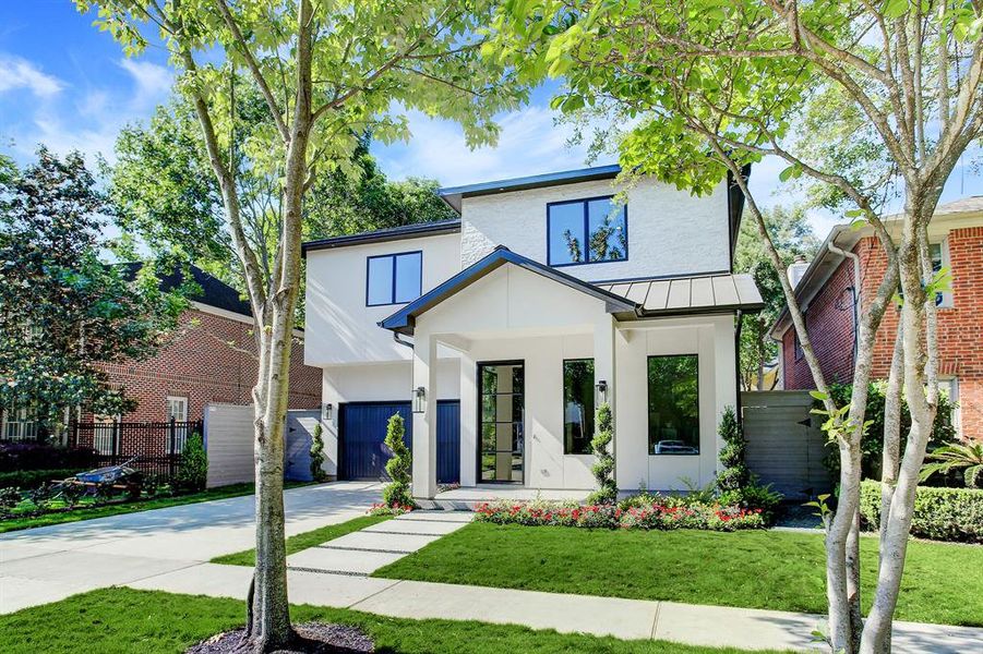 Clean crisp lines with lovely landscaping.  In addition to the obvious beauty of this great home Belmont Custom Homes provides the home buyer a 2/10 structural warranty.