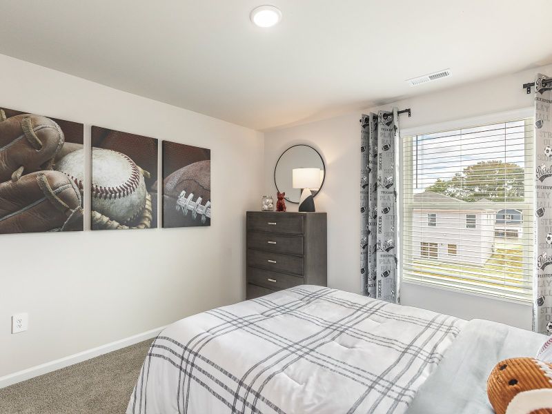 Secondary bedroom in the Chatham floorplan at a Meritage Homes community in Angier, NC.