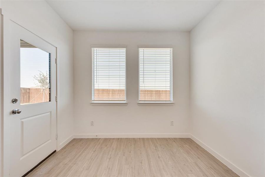 Unfurnished room featuring light hardwood / wood-style floors