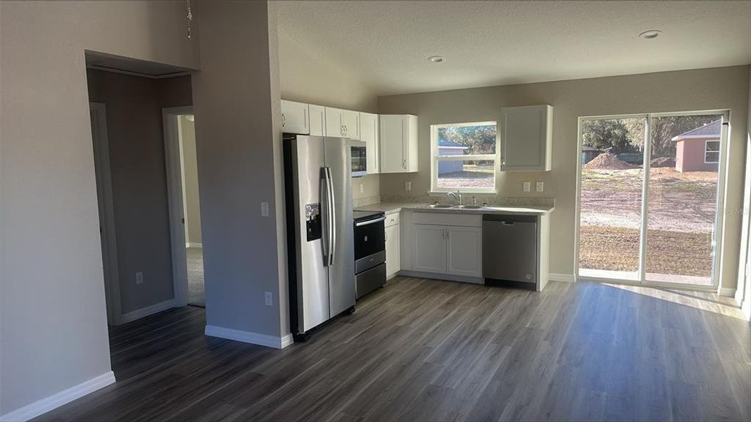 home will have LVP flooring like this example kitchen