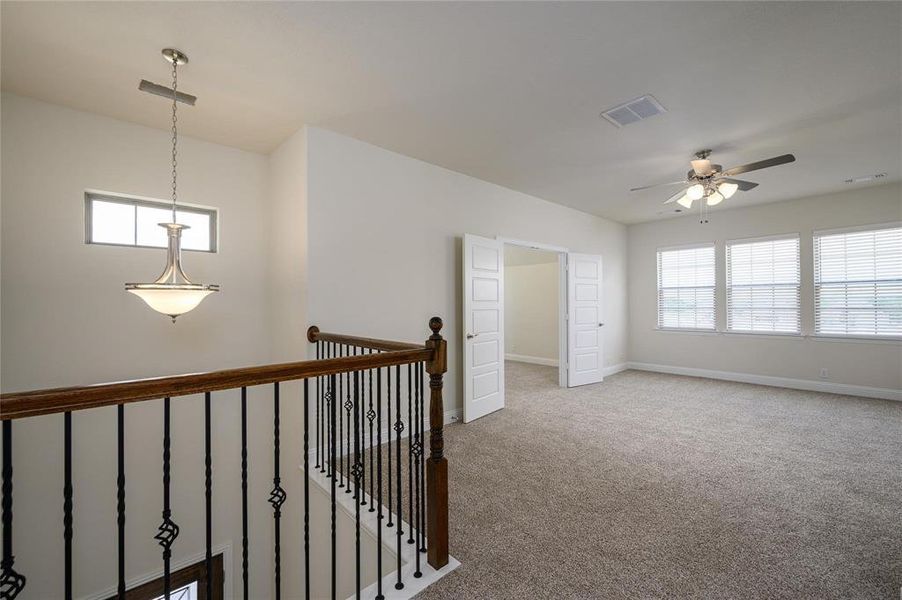 Hall featuring carpet floors