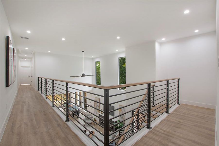 Hallway with light wood-type flooring