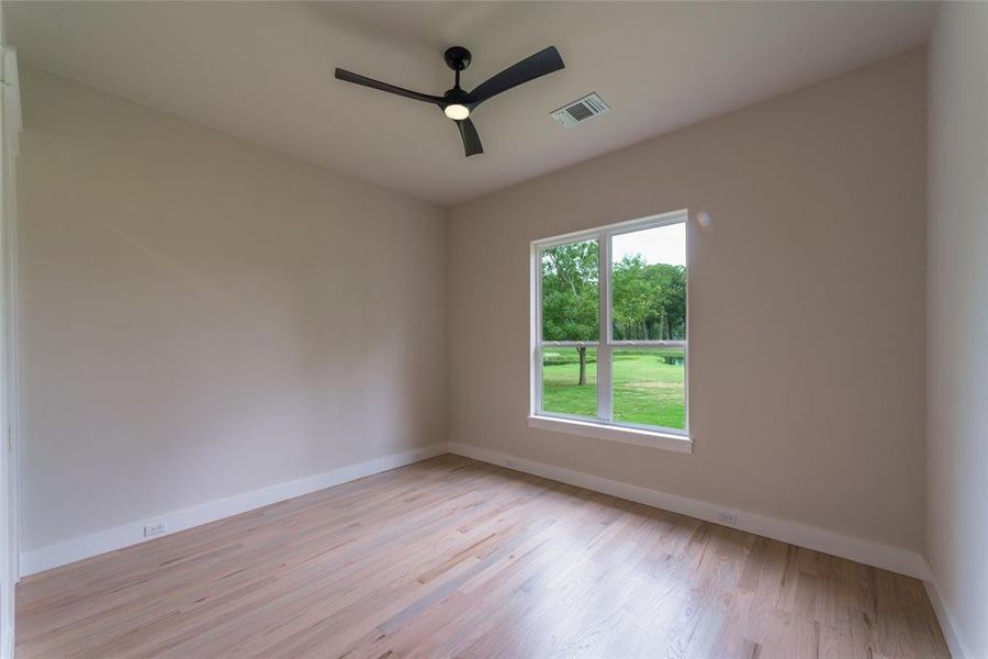 Guest room with golf course and pond views.