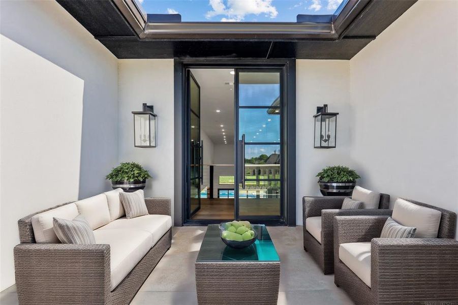 Virtually staged. Balcony overlooking peaceful neighborhood