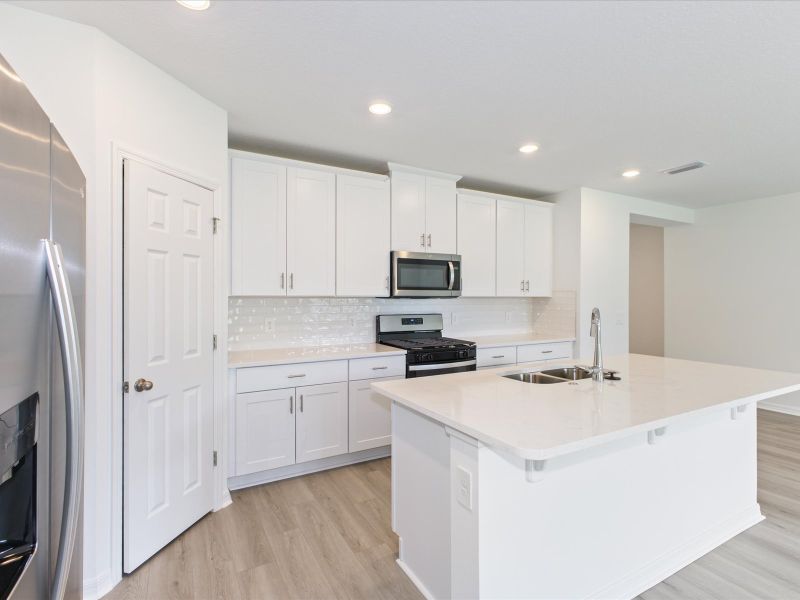 Kitchen in the Foxglove floorplan at 5166 Minneola Lane