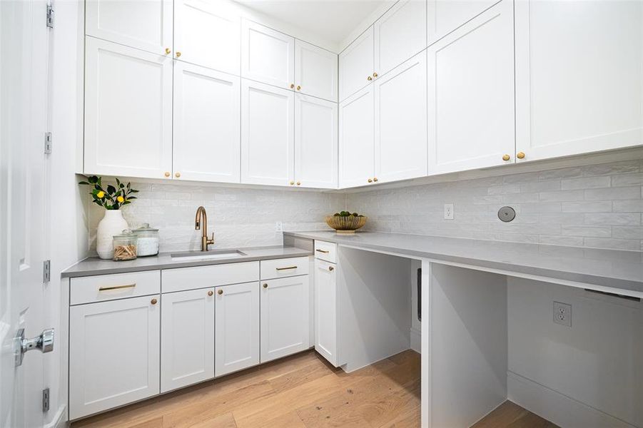 Photo of the showcase model home-extensive cabinet space to ceiling