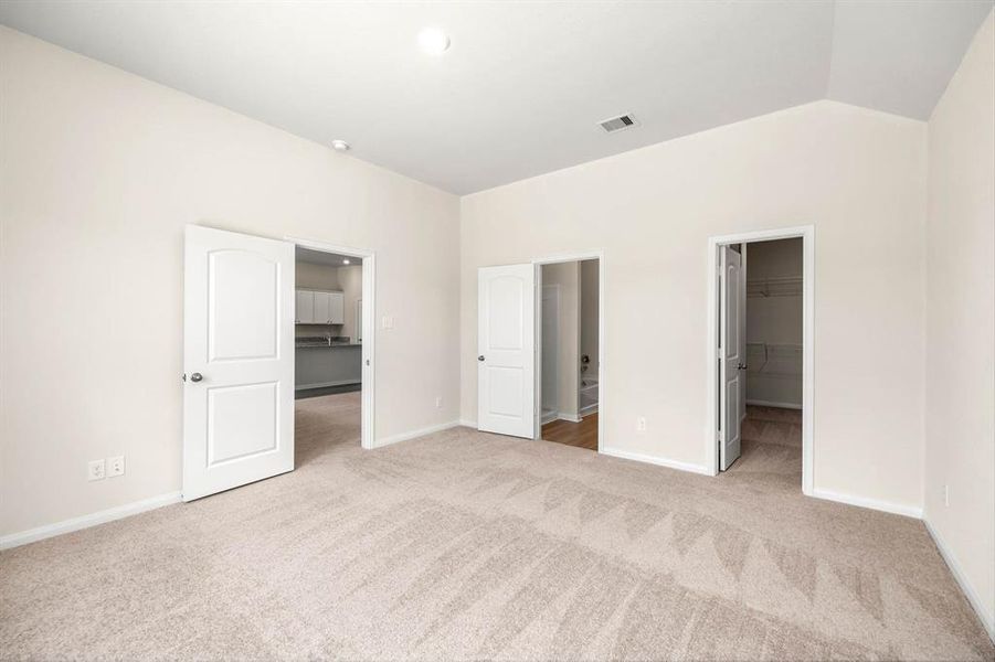 The Kendall floor plan features a large master bedroom suite that is situated on the opposite side of the home from the additional three bedrooms.