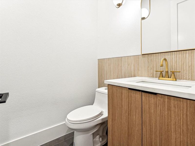 Bathroom with vanity and toilet