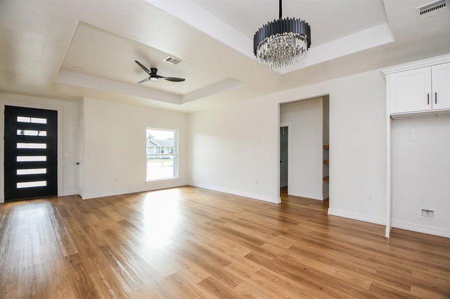 The coffered ceiling gives the room a lovely, elegant vibe, making it feel even more inviting and beautiful!