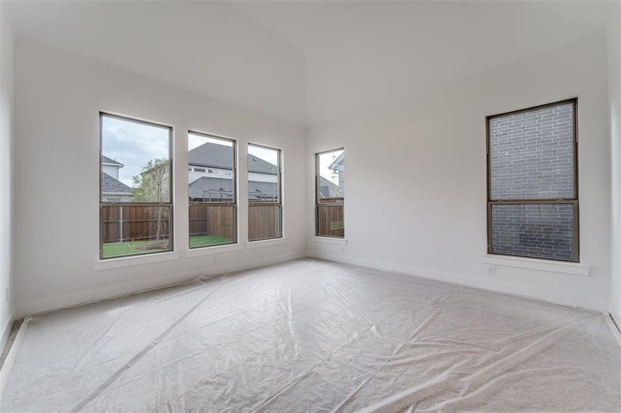 Spare room with light colored carpet