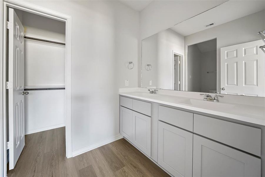 Primary bathroom with walk in closet