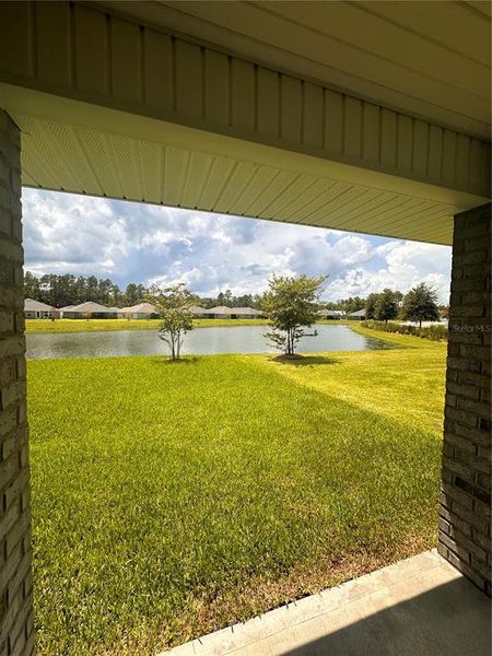 back covered lanai view of lake