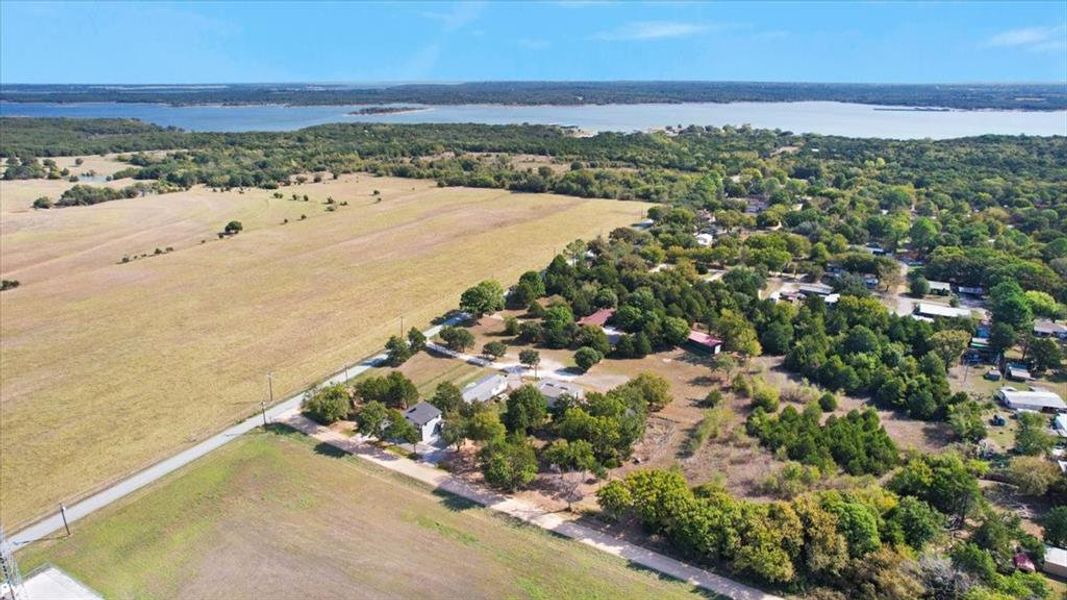 Bird's eye view with a rural view and a water view