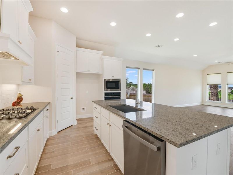 Another great view of the kitchen that shows the open feel and great natural light.