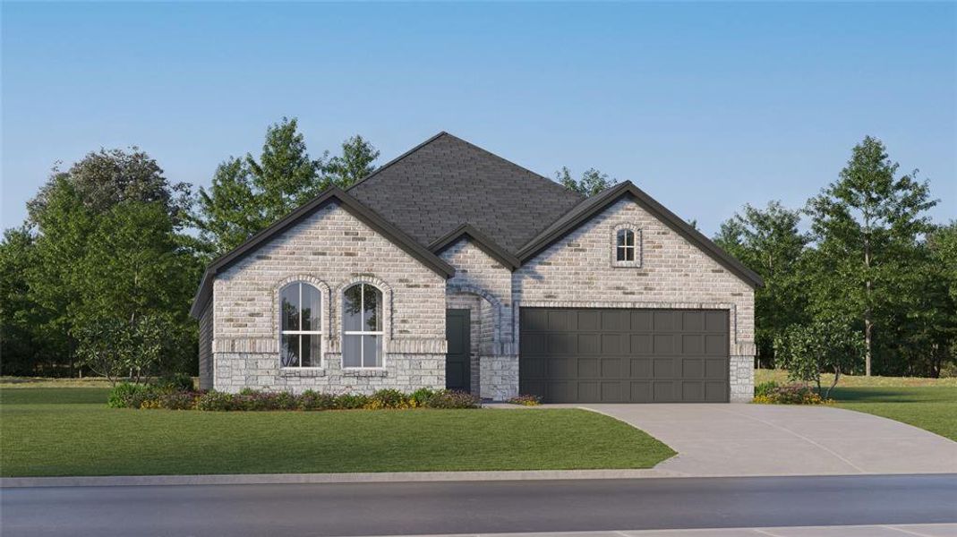 French country style house featuring a garage and a front yard