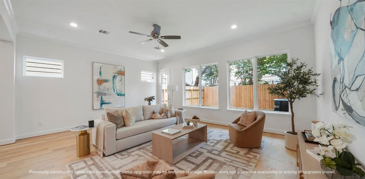 Natural Beauty: Enjoy the tranquility of your backyard views, enhanced by the optimal comfort of a thoughtfully included standard ceiling fan.