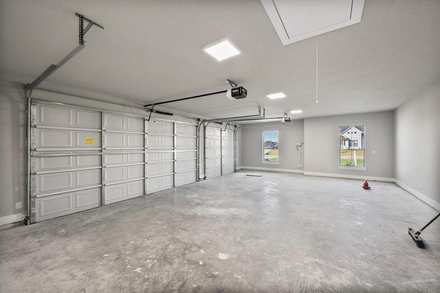 Oversized 3 car garage with 8 ft doors