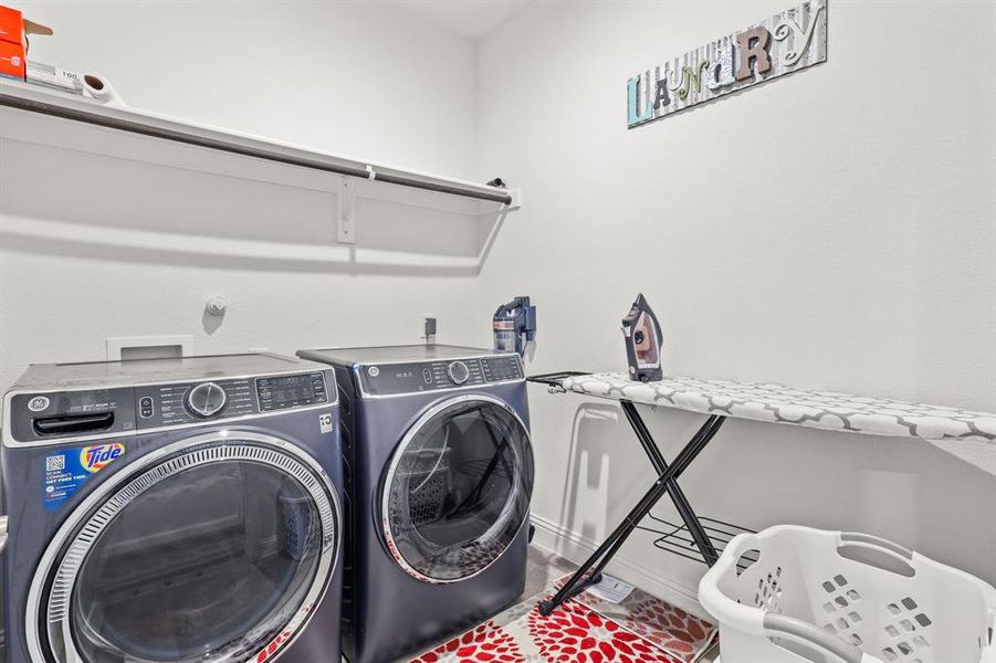 Laundry area with separate washer and dryer