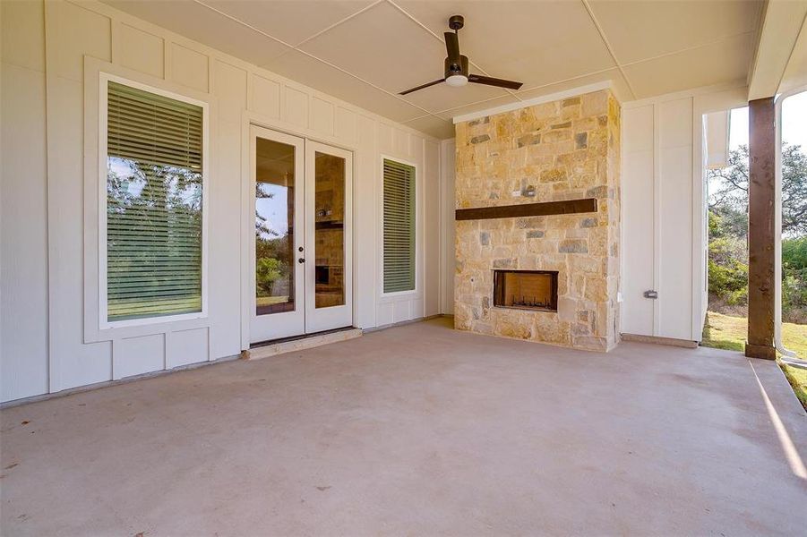 View of patio featuring ceiling fan and french doors