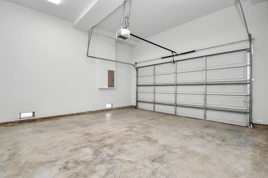 The extra wide garage offers plenty of room to accommodate larger vehicles, and the high ceilings are perfect for drop-down storage areas!