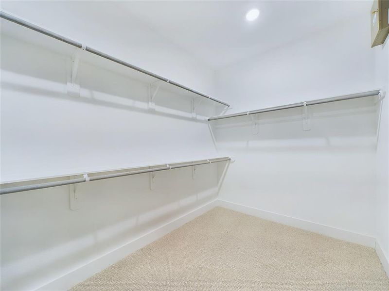 Large Walk-In Closet in Master Bedroom. Model home photos, finishes and floor plan MAY VARY!