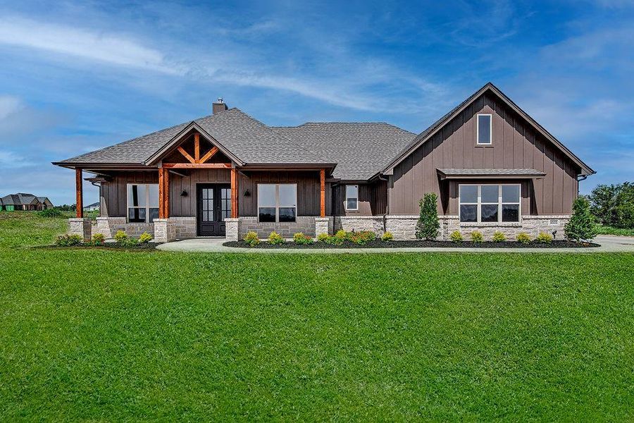 View of front of property featuring a front yard