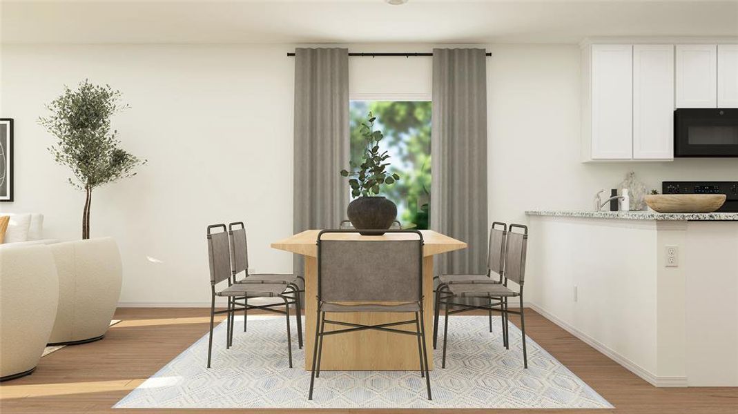 Dining room featuring light hardwood / wood-style floors