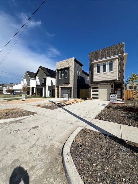 View of front of home featuring a garage