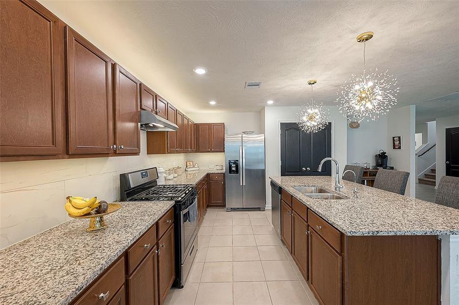 Granite counter tops and stainless steal appliances! REFRIGERATOR INCLUDED :-)